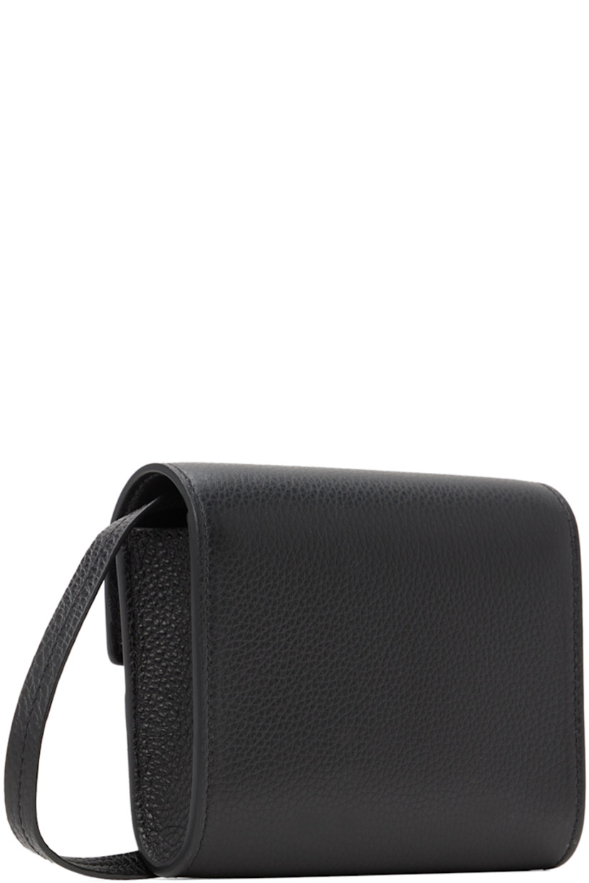 Grained calfskin shoulder bag in black.

· Adjustable and detachable crossbody strap
· Press-stud flap
· Six card slots at interior
· Buffed leather lining
· Gold-tone hardware
· H4.5" x W4.75" x D1.5"

Supplier color: Black