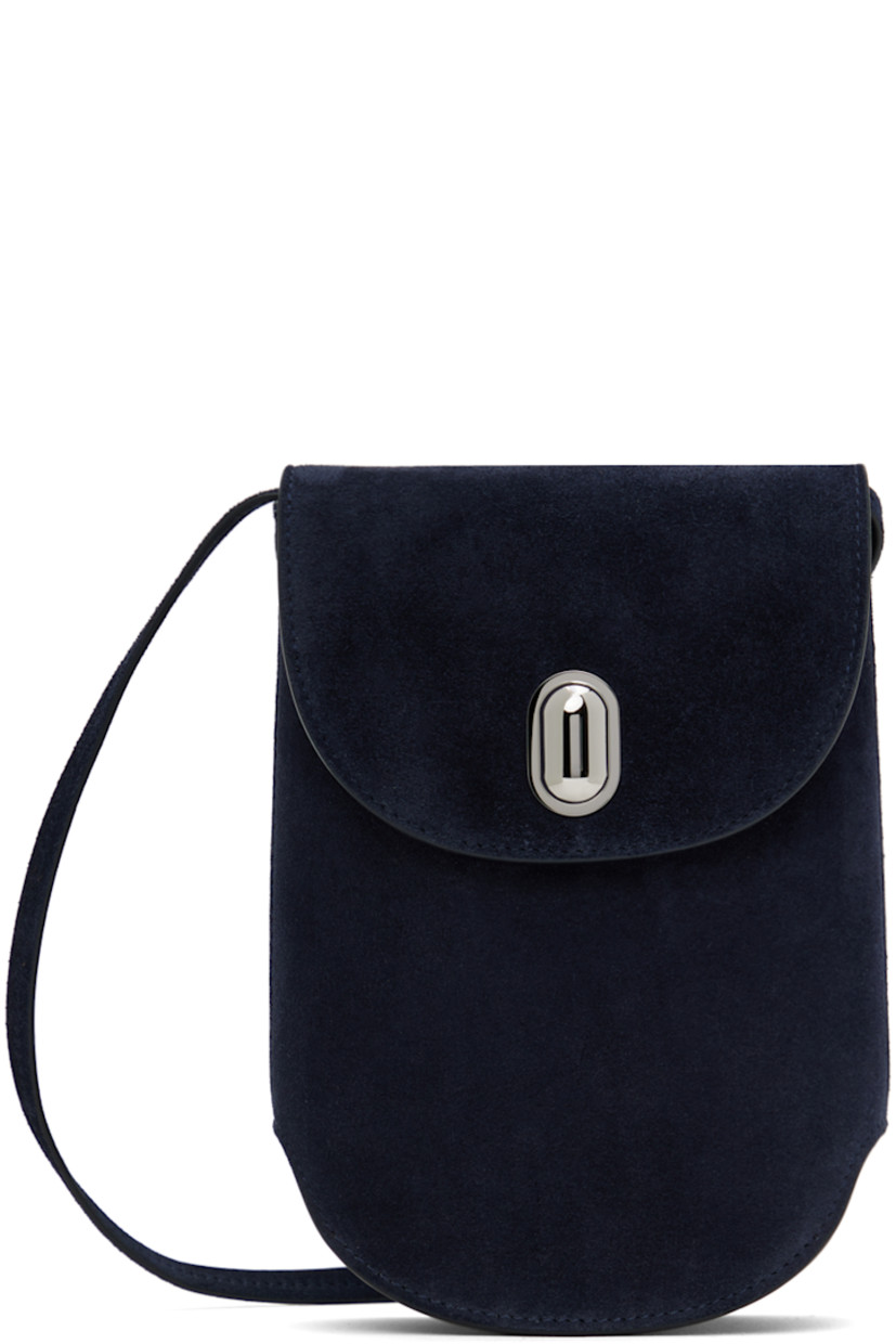 Handcrafted calfskin suede shoulder bag in navy.

· Adjustable and detachable crossbody strap
· Logo embossed at back face
· Hardware at magnetic flap
· Card slot at interior
· H7.5" x W6" x D2"

Supplier color: Navy