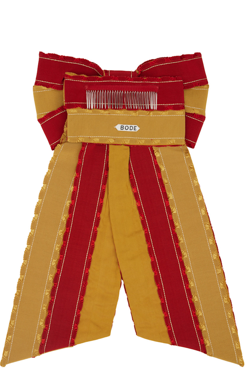 Cotton-and viscose-blend grosgrain and barathea barrette in red and yellow. Ruffled trim throughout.

· Bow accent at face
· Logo patch at back face
· French-comb fastening
· Fastening: W4.5"
· H17" x W11"

This item is part of a limited run of 17.

Supplier color: Orange Yellow