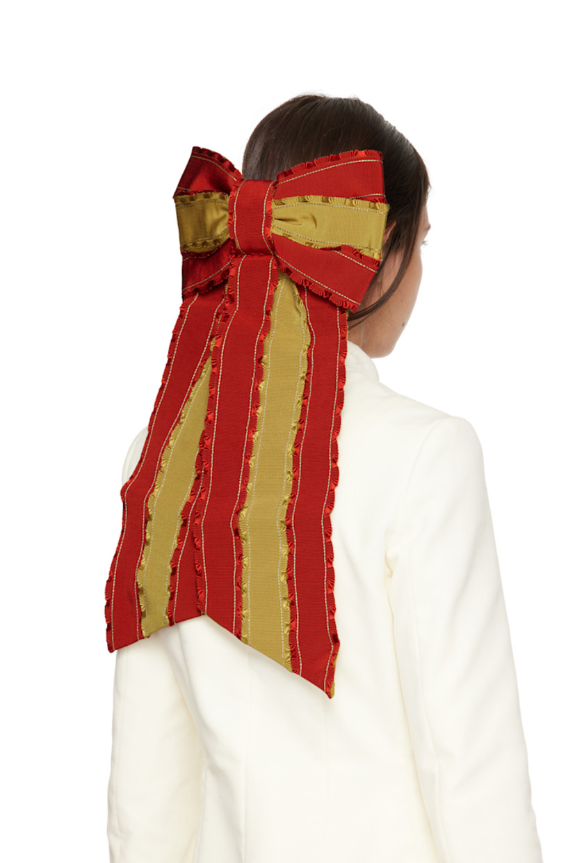Cotton-and viscose-blend grosgrain and barathea barrette in red and yellow. Ruffled trim throughout.

· Bow accent at face
· Logo patch at back face
· French-comb fastening
· Fastening: W4.5"
· H17" x W11"

This item is part of a limited run of 17.

Supplier color: Orange Yellow