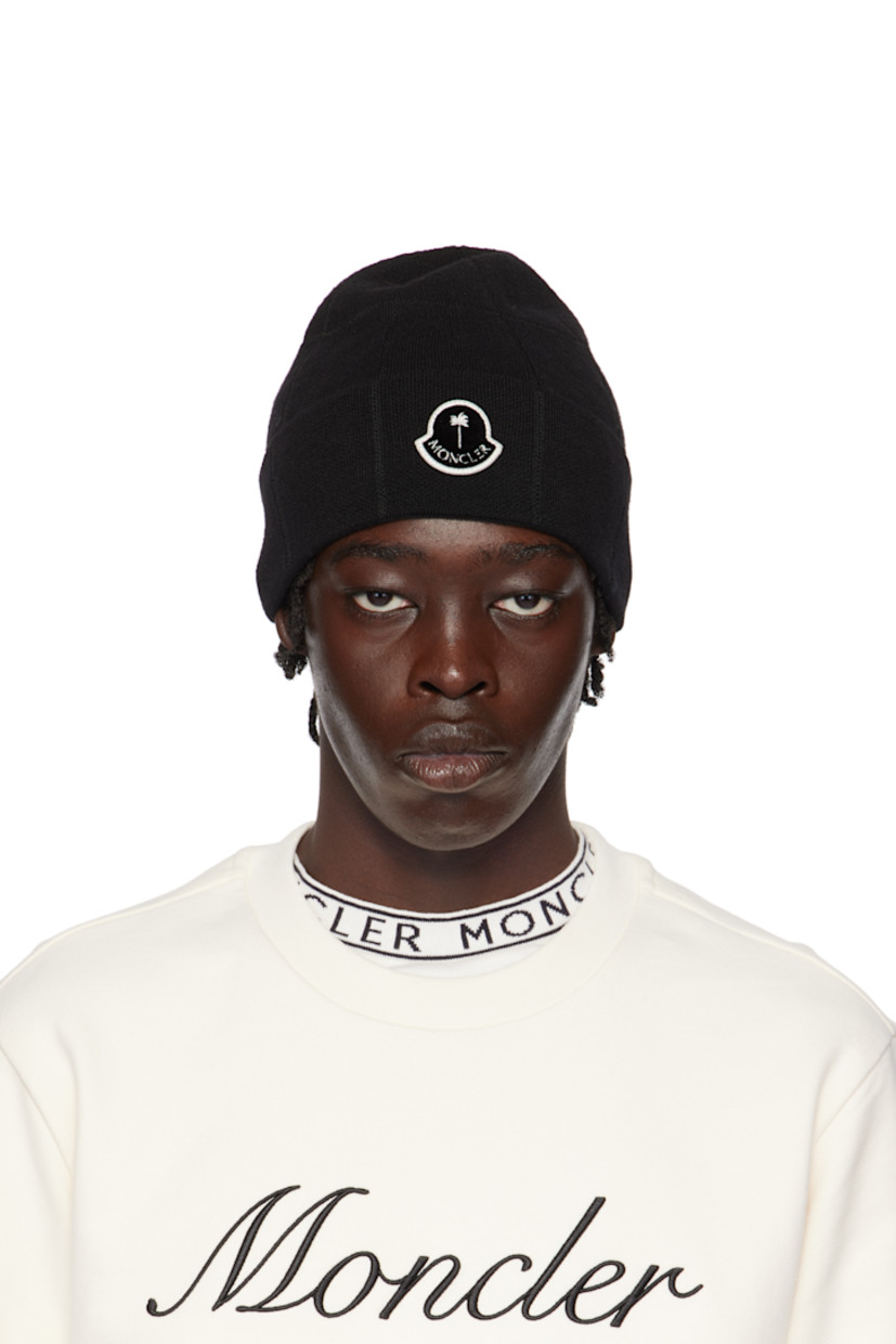 Knit stretch virgin wool-blend beanie in black. Logo patch at rolled brim. 

Part of the Moncler Genius x Palm Angels collaboration.

Supplier color: Black