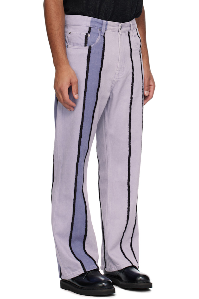 Flared non-stretch denim jeans. Fading throughout.

· Paneled construction
· Belt loops
· Five-pocket styling
· Zip-fly
· Hand-sewn stripes at legs
· Leather logo patch at back waistband
· Logo-engraved gunmetal-tone hardware

Each item is unique. Please note that finishing may vary.

Supplier color: Purple