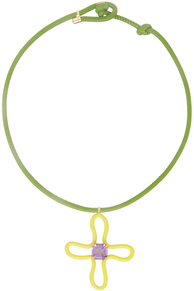 Handcrafted leather cord choker-style necklace in green. Graphic pendant in yellow enameled sterling silver.

· Prong-set princess-cut 4.10 ct amethyst
· 9k gold hardware
· Toggle fastening
· L16.5"

Supplier color: Yellow/Green