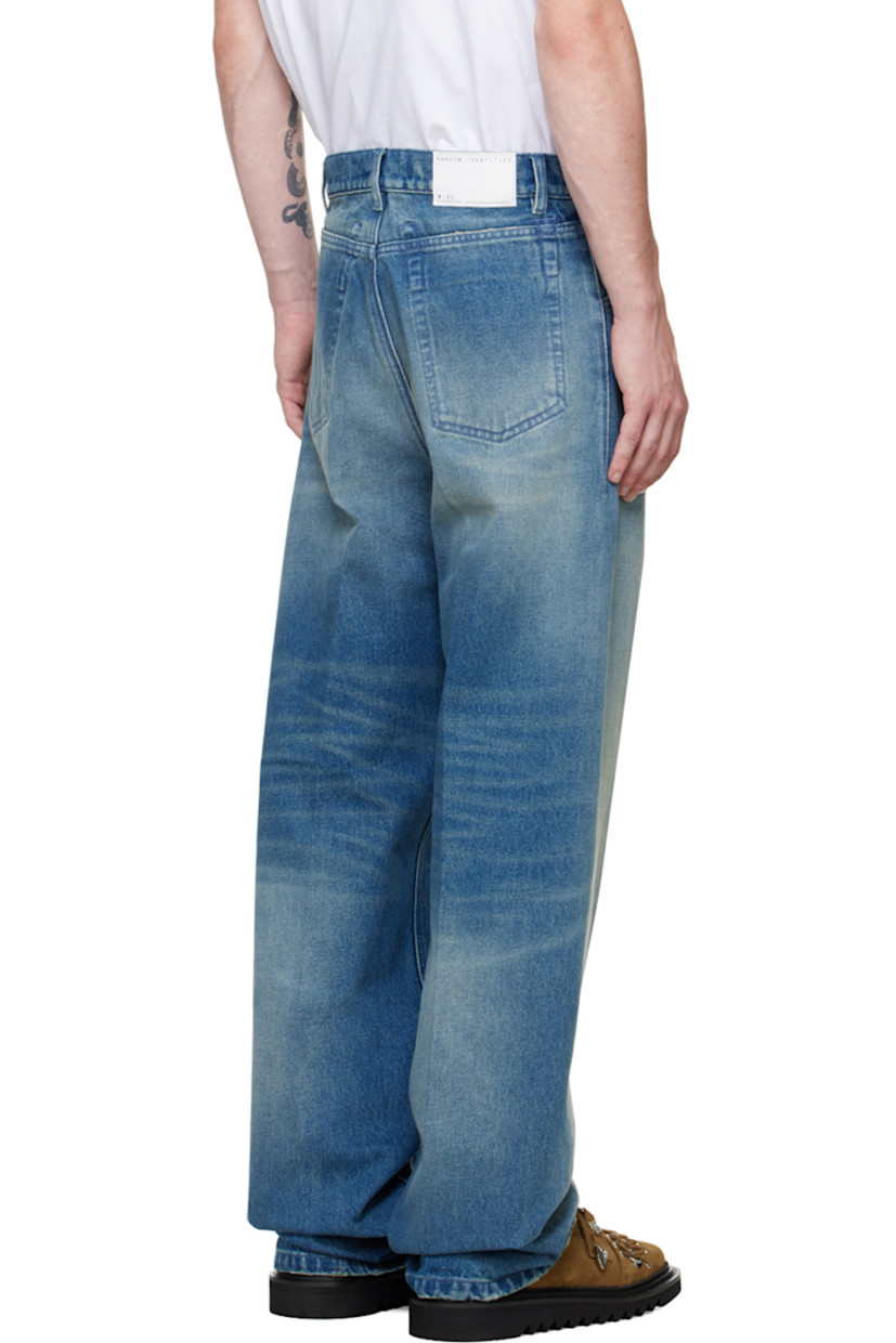 Non-stretch denim jeans. Fading and whiskering throughout.

· Belt loops
· Logo flag and press-stud fastening at waistband
· Five-pocket styling
· Zip-fly
· Logo patch at back waistband 
· Logo-engraved brass-tone hardware
· Contrast stitching in tan 

Supplier color: Blue
