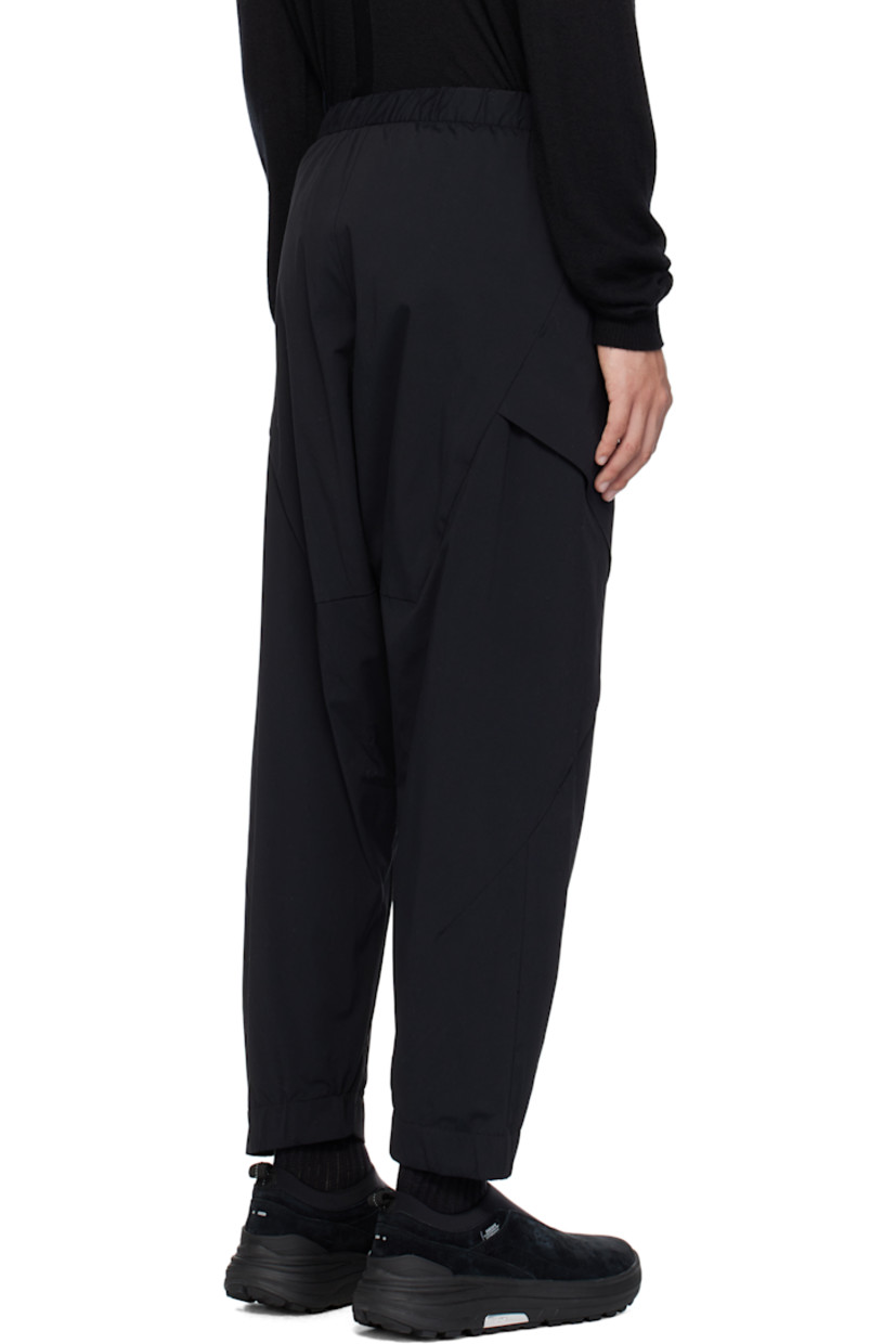 Stretch nylon taffeta cargo pants.

· Paneled construction
· Press-release belt at elasticized waistband
· Two-pocket styling
· Exposed zip-fly
· Zip pockets at front
· Darts at legs
· Elasticized cuffs
· Full ripstop lining

Supplier color: Black