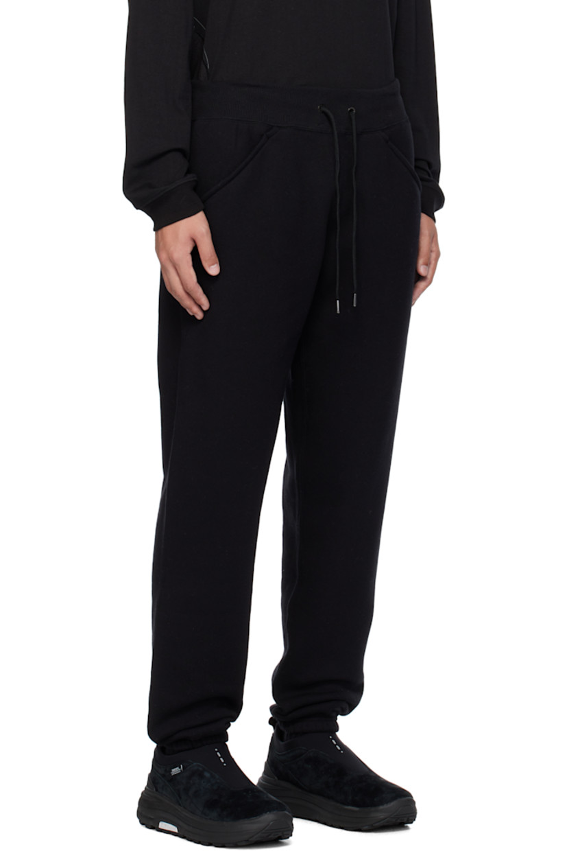 Tapered cotton- and wool-blend fleece sweatpants.

· Drawstring at rib-knit elasticized waistband
· Four-pocket styling
· Elasticized cuffs

Supplier color: Black