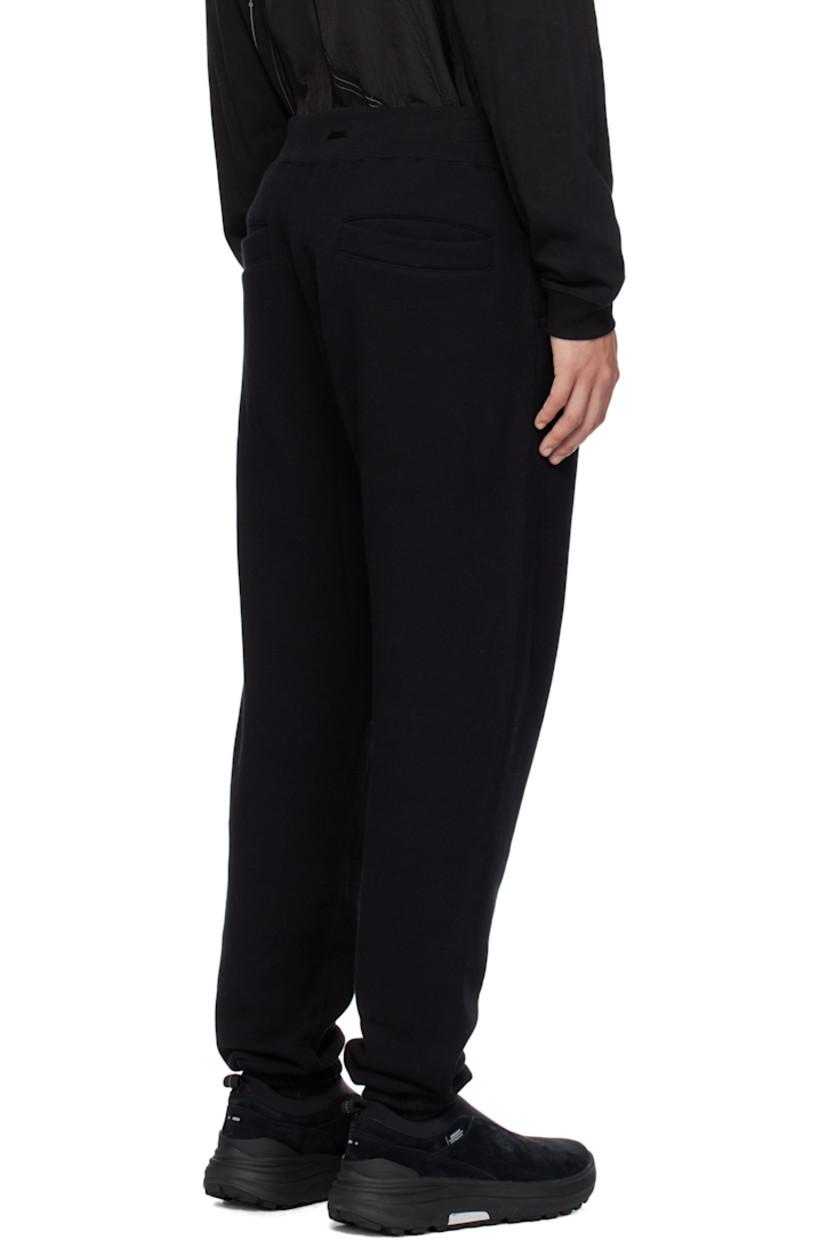 Tapered cotton- and wool-blend fleece sweatpants.

· Drawstring at rib-knit elasticized waistband
· Four-pocket styling
· Elasticized cuffs

Supplier color: Black