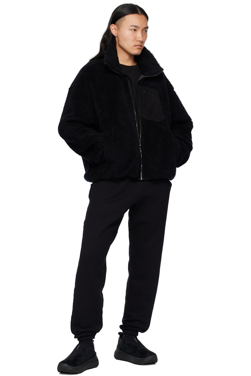 Tapered cotton- and wool-blend fleece sweatpants.

· Drawstring at rib-knit elasticized waistband
· Four-pocket styling
· Elasticized cuffs

Supplier color: Black