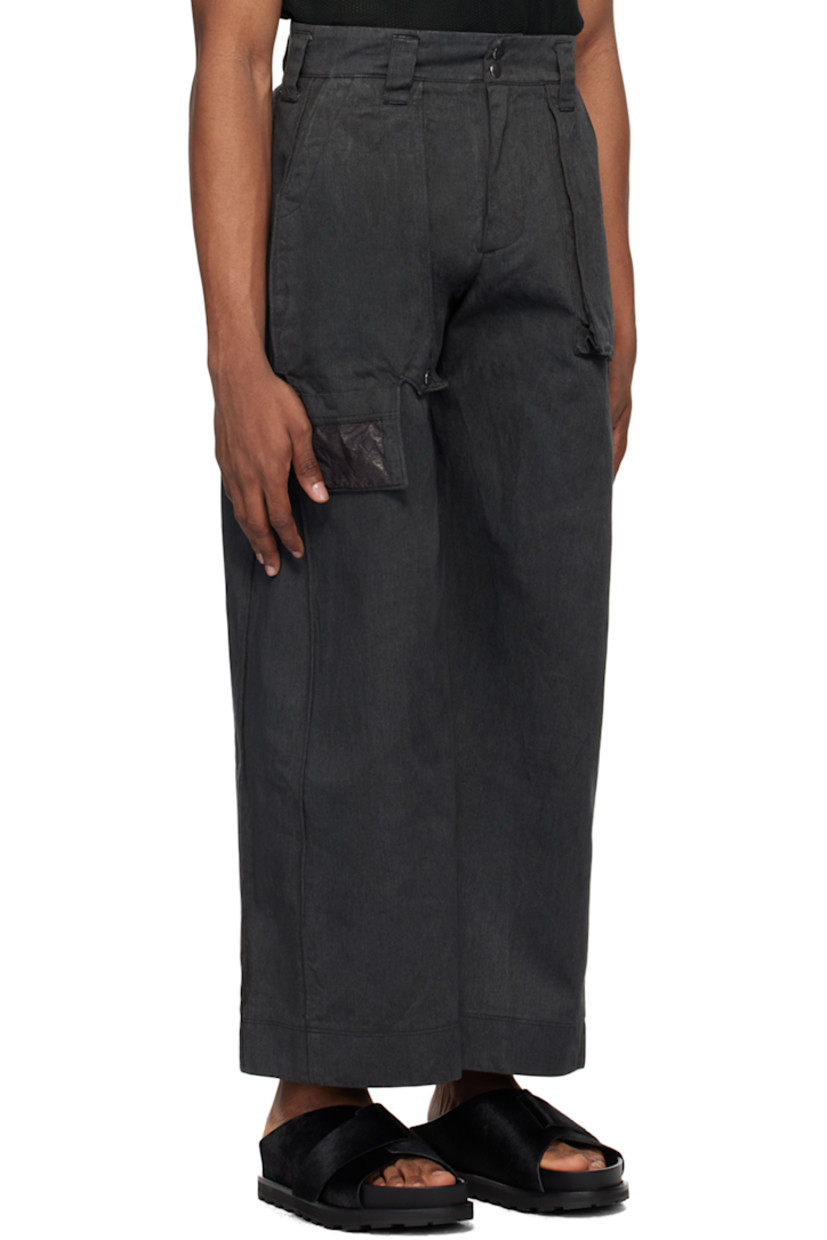 Garment-dyed cotton twill cargo pants.

· Belt loops
· Four-pocket styling
· Zip-fly
· Press-stud panel at front
· Patch pocket at panel

Available exclusively at SSENSE.

Supplier color: Charcoal
