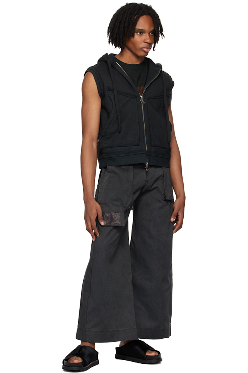 Garment-dyed cotton twill cargo pants.

· Belt loops
· Four-pocket styling
· Zip-fly
· Press-stud panel at front
· Patch pocket at panel

Available exclusively at SSENSE.

Supplier color: Charcoal