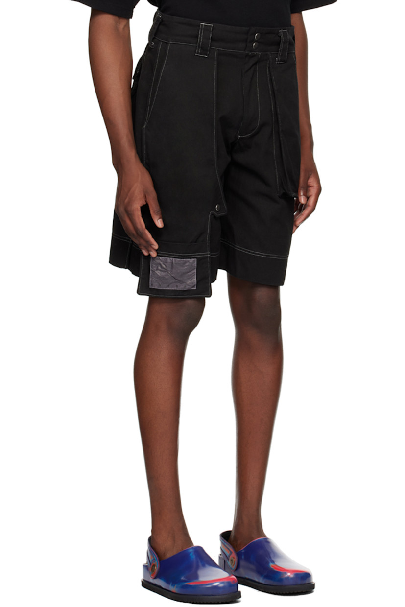 Garment-dyed non-stretch denim shorts.

· Belt loops
· Four-pocket styling
· Zip-fly
· Press-stud panel at front
· Patch pocket and logo patch at panel
· Contrast stitching in white

Supplier color: Black