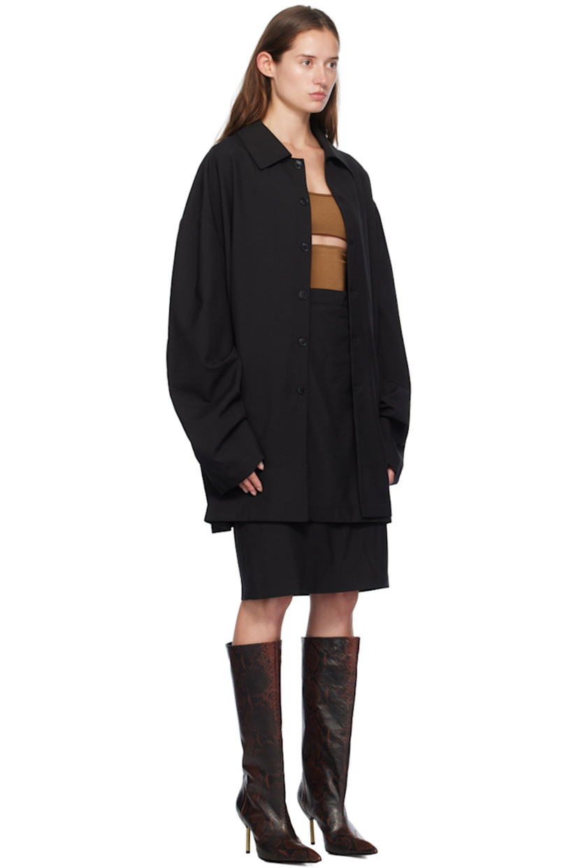 Plain-woven stretch virgin wool twin-set-style dress. 

· Layered and integrated construction 
· Spread collar
· Button placket at front
· Dropped shoulders
· Darts and concealed zip closure at back
· Central vent at back hem
· Unlined

Supplier color: Black