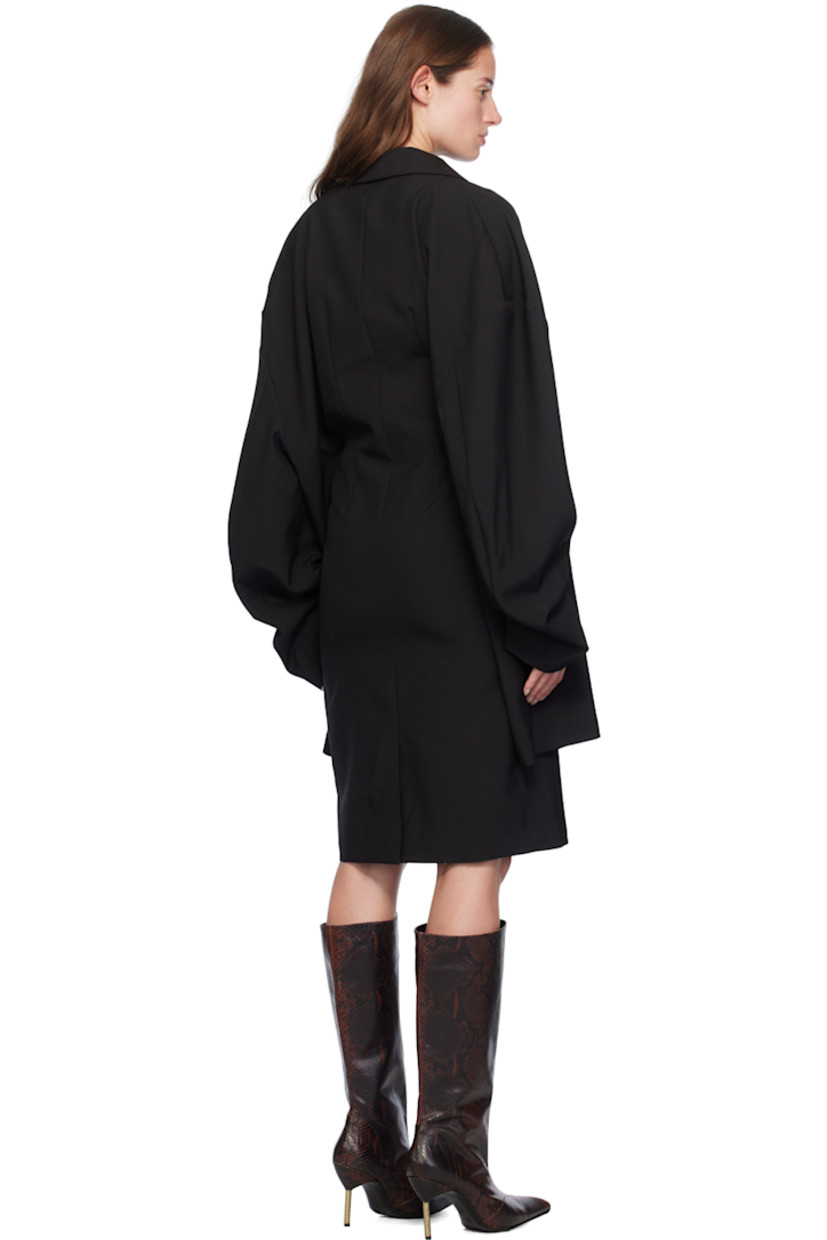 Plain-woven stretch virgin wool twin-set-style dress. 

· Layered and integrated construction 
· Spread collar
· Button placket at front
· Dropped shoulders
· Darts and concealed zip closure at back
· Central vent at back hem
· Unlined

Supplier color: Black