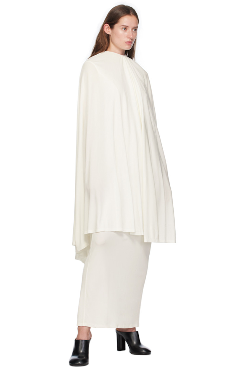 Viscose jersey dress. Cape-style overlay at shoulders.

· Self-tie fastening at round neck
· Hook-eye fastening at back collar
· Fully lined 

Supplier color: Off-White
