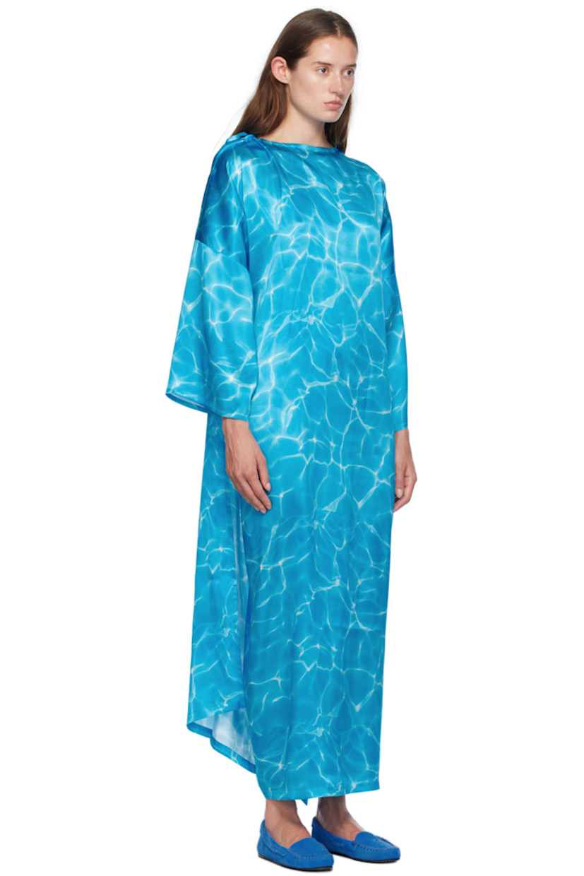 Silk satin dress. Graphic pattern printed throughout. 

· Wrap construction 
· Boat neck 
· Detachable self-tie belt at waist
· Dropped shoulders
· Self-tie fastening at back 
· Unlined

Supplier color: Turquoise print
