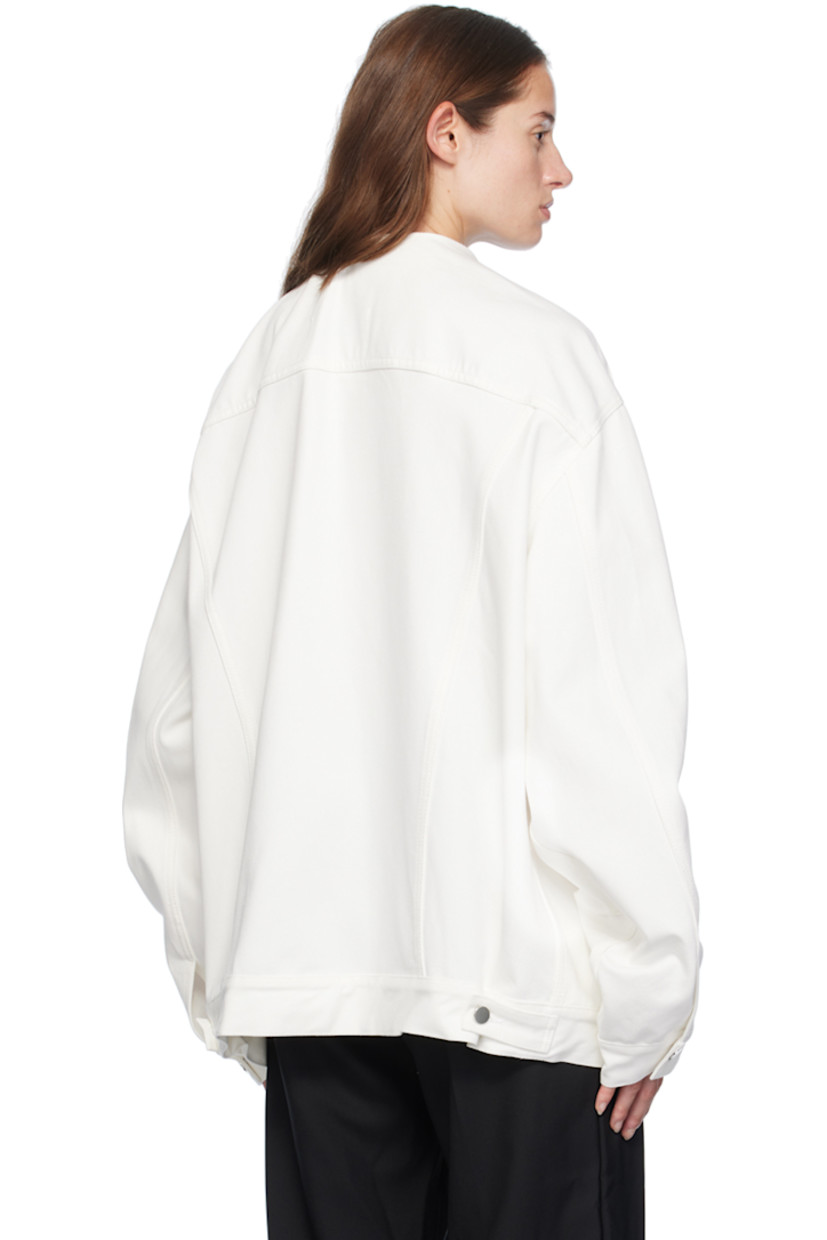 Non-stretch denim jacket. 

· Round neck with fixed rolled collar
· Button closure
· Flap and welt pockets
· Dropped shoulders
· Single-button barrel cuffs
· Adjustable button-tabs at back hem
· Silver-tone hardware

Supplier color: White
