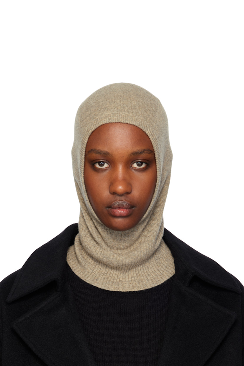 Knit cashmere balaclava in beige. Rib-knit trim at opening and collar. 

Supplier color: Biscuit