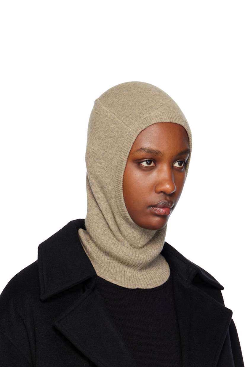 Knit cashmere balaclava in beige. Rib-knit trim at opening and collar. 

Supplier color: Biscuit