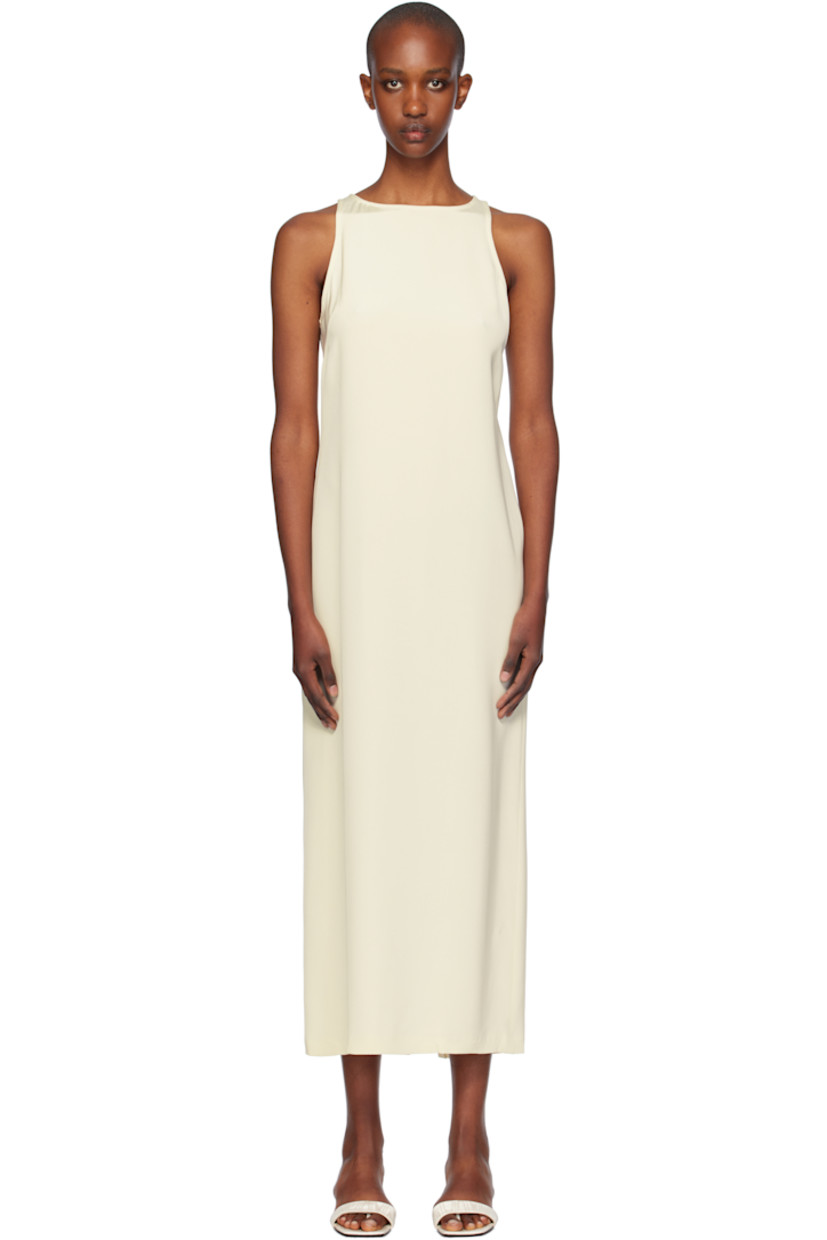 Silk crepe de chine midi dress. 

· Round neck
· Button fastening at back collar
· Concealed zip closure at back 
· Central vent at back hem
· Unlined

Supplier color: Off white
