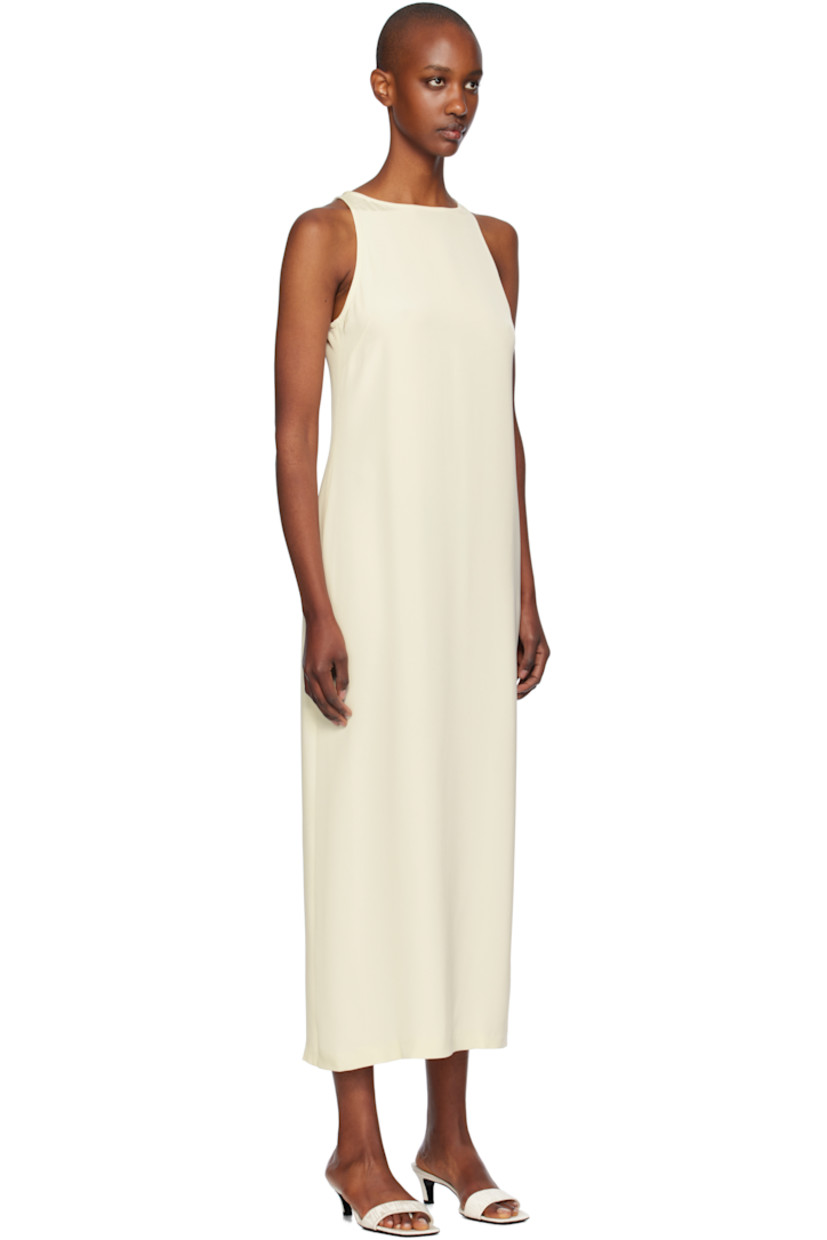 Silk crepe de chine midi dress. 

· Round neck
· Button fastening at back collar
· Concealed zip closure at back 
· Central vent at back hem
· Unlined

Supplier color: Off white
