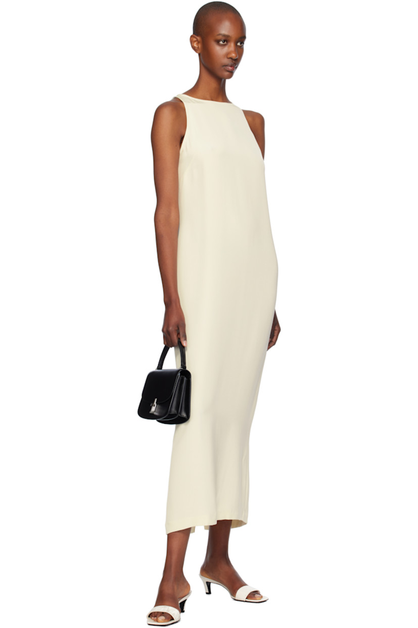 Silk crepe de chine midi dress. 

· Round neck
· Button fastening at back collar
· Concealed zip closure at back 
· Central vent at back hem
· Unlined

Supplier color: Off white