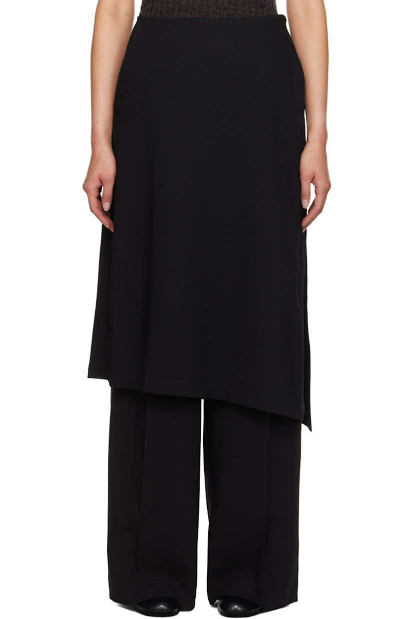 Mulesing-free virgin wool twill trousers. 

· Skirt-style overlay with button fastening 
· Four-pocket styling
· Pleats at front 
· Concealed zip closure at outseam 

Supplier color: Black