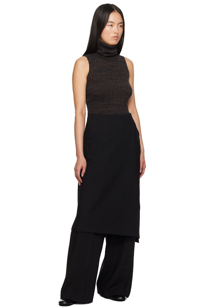 Mulesing-free virgin wool twill trousers. 

· Skirt-style overlay with button fastening 
· Four-pocket styling
· Pleats at front 
· Concealed zip closure at outseam 

Supplier color: Black