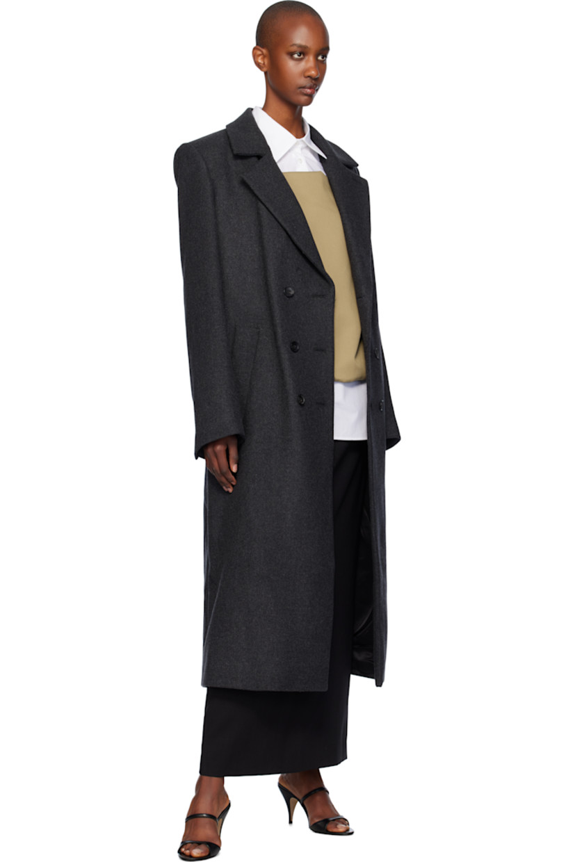 Mulesing-free virgin wool twill maxi skirt.

· High-rise
· Two-pocket styling
· Concealed zip closure at side seam
· Central vent at back hem
· Full silk satin lining

Supplier color: Black