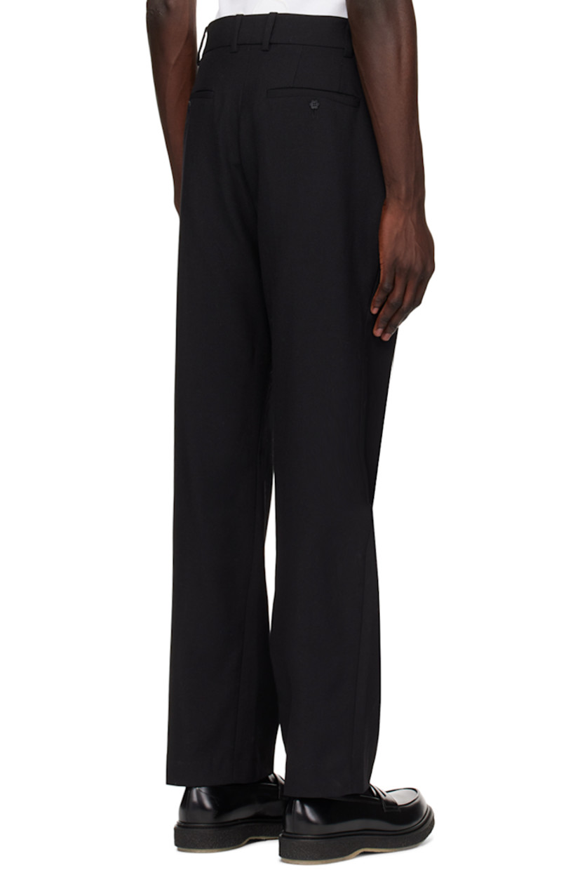 Recycled polyester- and wool-blend twill trousers.

· Belt loops
· Four-pocket styling
· Zip-fly
· Pleats at front
· Creased legs
 
Supplier color: Black