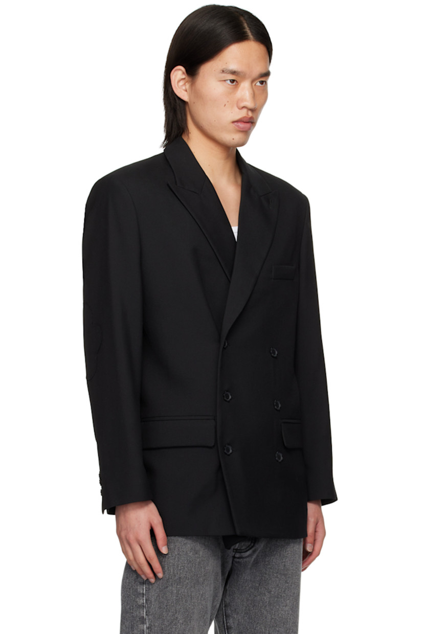 Wool-blend delaine blazer.

· Peaked lapel
· Double-breasted button closure
· Welt pocket and flap pockets
· Padded shoulders
· Graphic panel at elbows
· Three-button surgeon's cuffs
· Locker loop at inner collar
· Welt pockets at interior
· Full viscose satin lining
· Graphic hardware

Supplier color: Black