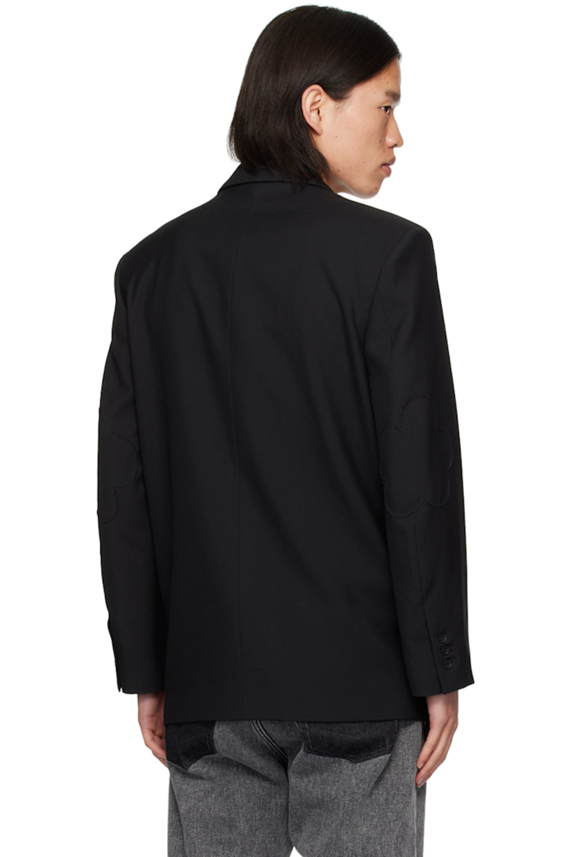 Wool-blend delaine blazer.

· Peaked lapel
· Double-breasted button closure
· Welt pocket and flap pockets
· Padded shoulders
· Graphic panel at elbows
· Three-button surgeon's cuffs
· Locker loop at inner collar
· Welt pockets at interior
· Full viscose satin lining
· Graphic hardware

Supplier color: Black