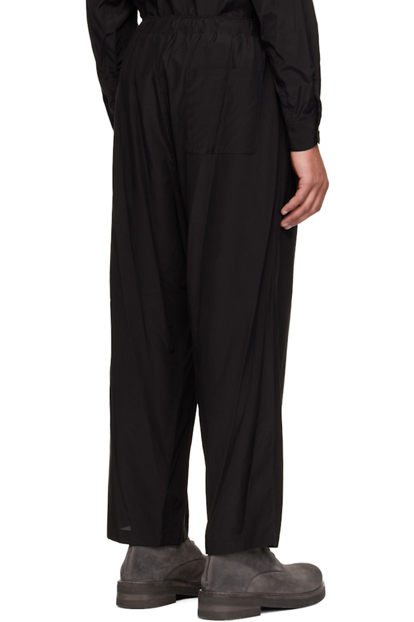 Plain-woven rayon and cotton-blend trousers.

· Drawstring at elasticized waistband
· Three-pocket styling
· Zip-fly
· Pleats at front waistband

Supplier color: Black