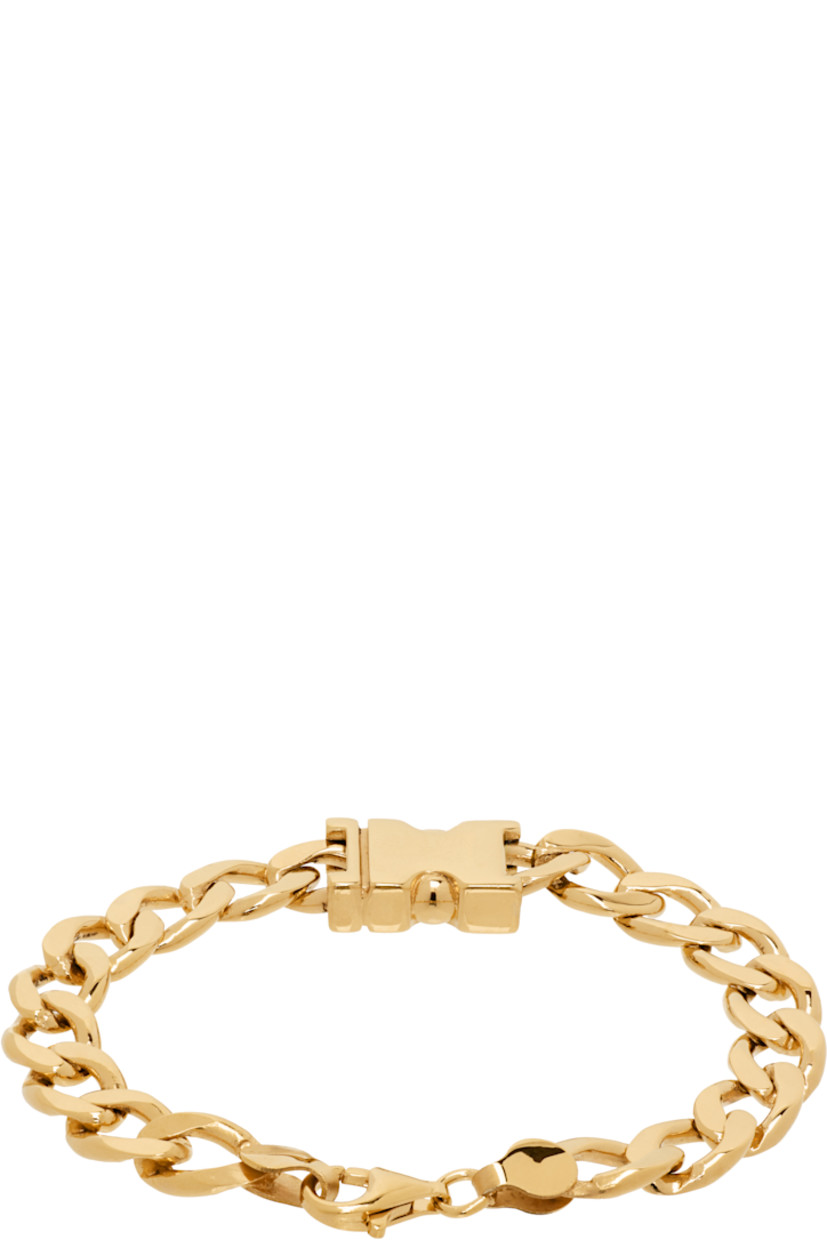 Curb chain bracelet in gold-tone sterling silver.

· Press-release hardware at face
· Lobster-clasp fastening 

Supplier color: Gold vermeil