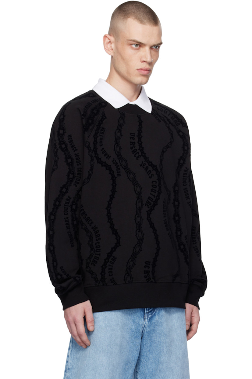 Relaxed-fit cotton fleece sweatshirt. 

· Logo graphic pattern flocked throughout
· Rib-knit crewneck, hem, and cuffs 
· Raglan sleeves

Supplier color: Black