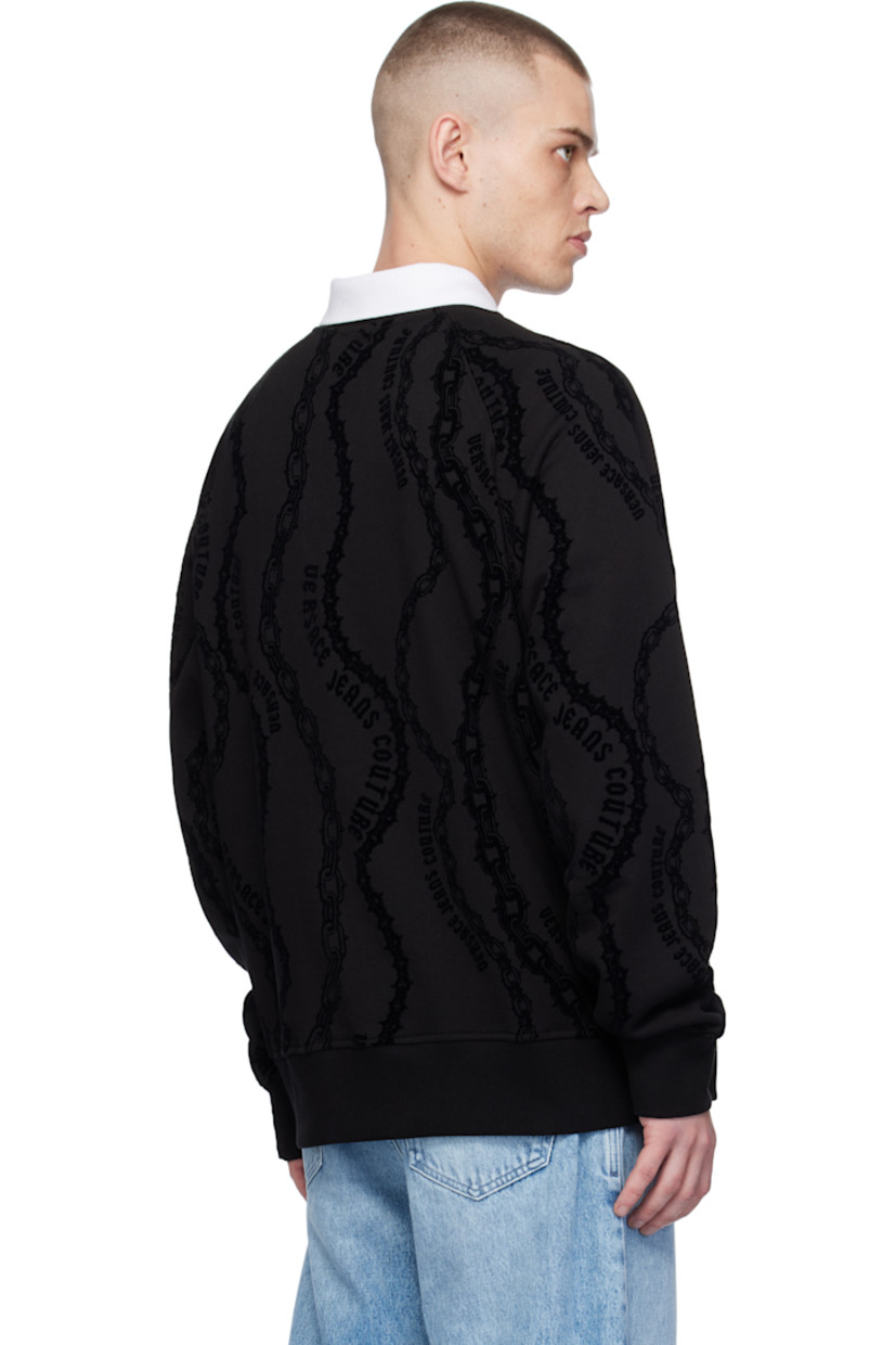 Relaxed-fit cotton fleece sweatshirt. 

· Logo graphic pattern flocked throughout
· Rib-knit crewneck, hem, and cuffs 
· Raglan sleeves

Supplier color: Black