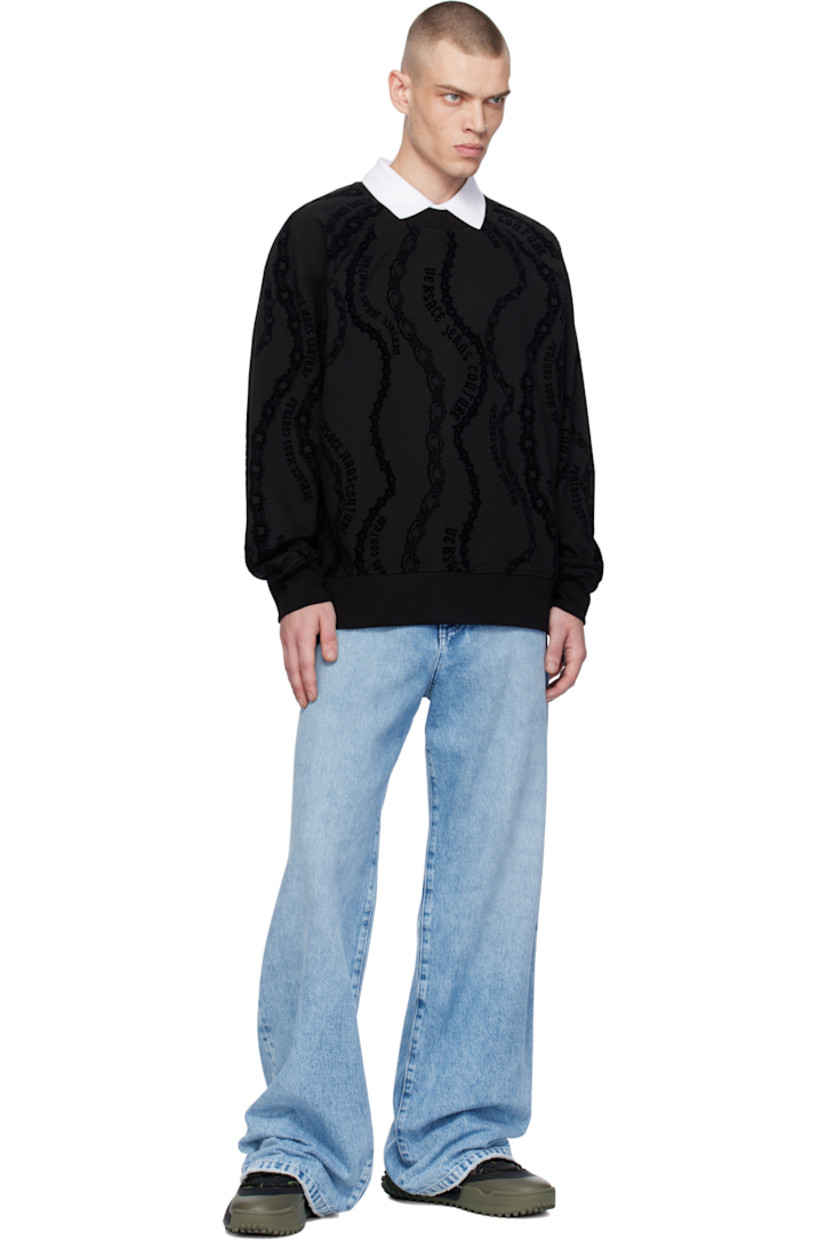 Relaxed-fit cotton fleece sweatshirt. 

· Logo graphic pattern flocked throughout
· Rib-knit crewneck, hem, and cuffs 
· Raglan sleeves

Supplier color: Black