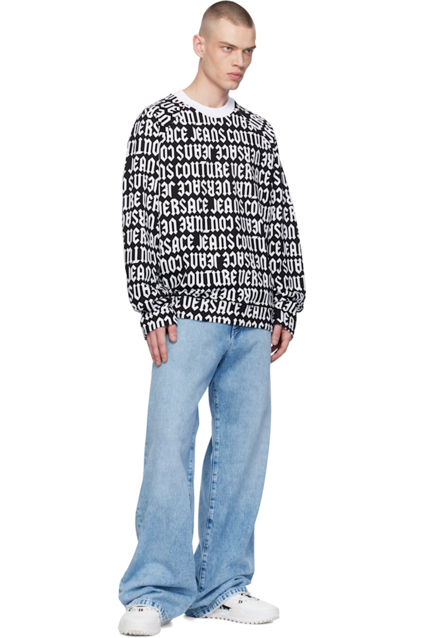Relaxed-fit French terry sweatshirt. Logo pattern printed throughout.

· Rib-knit crewneck, hem, and cuffs
· Raglan sleeves

Supplier color: Black