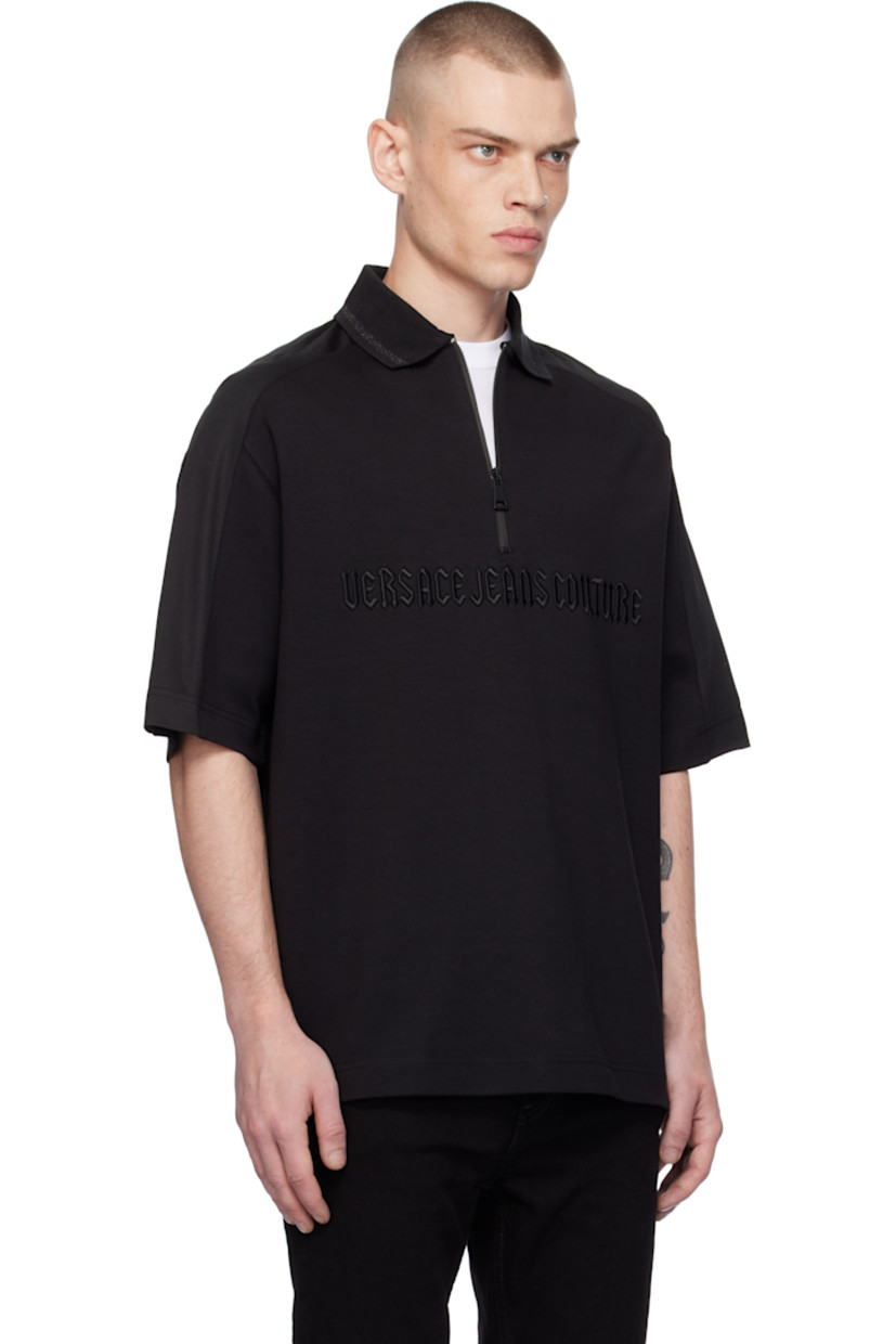 Cotton-blend interlock jersey polo. 

· Paneled construction 
· Metallic stripe at rib-knit spread collar 
· Half-zip closure 
· Logo embroidered at front 
· Mesh trim at saddle shoulders 

Supplier color: Black