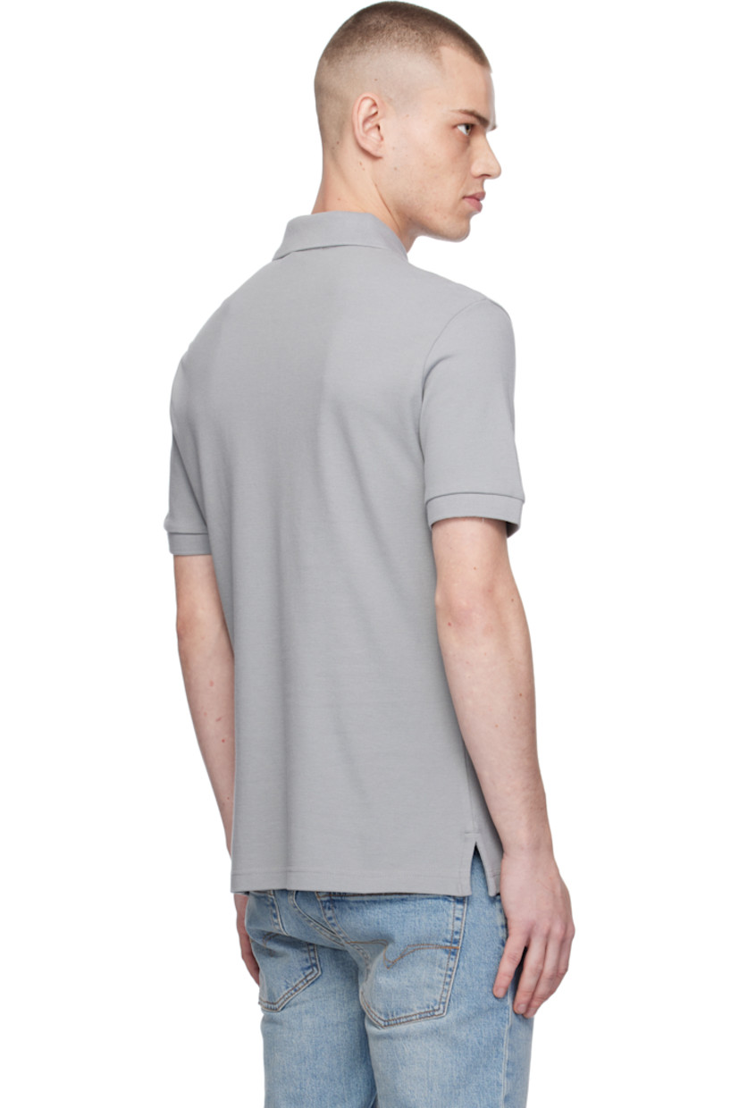 Slim-fit cotton piqué polo. 

·  Rib-knit spread collar and cuffs 
· Three-button placket
· Silver-tone logo plaque at chest
· Tennis-tail hem

Supplier color: Grey