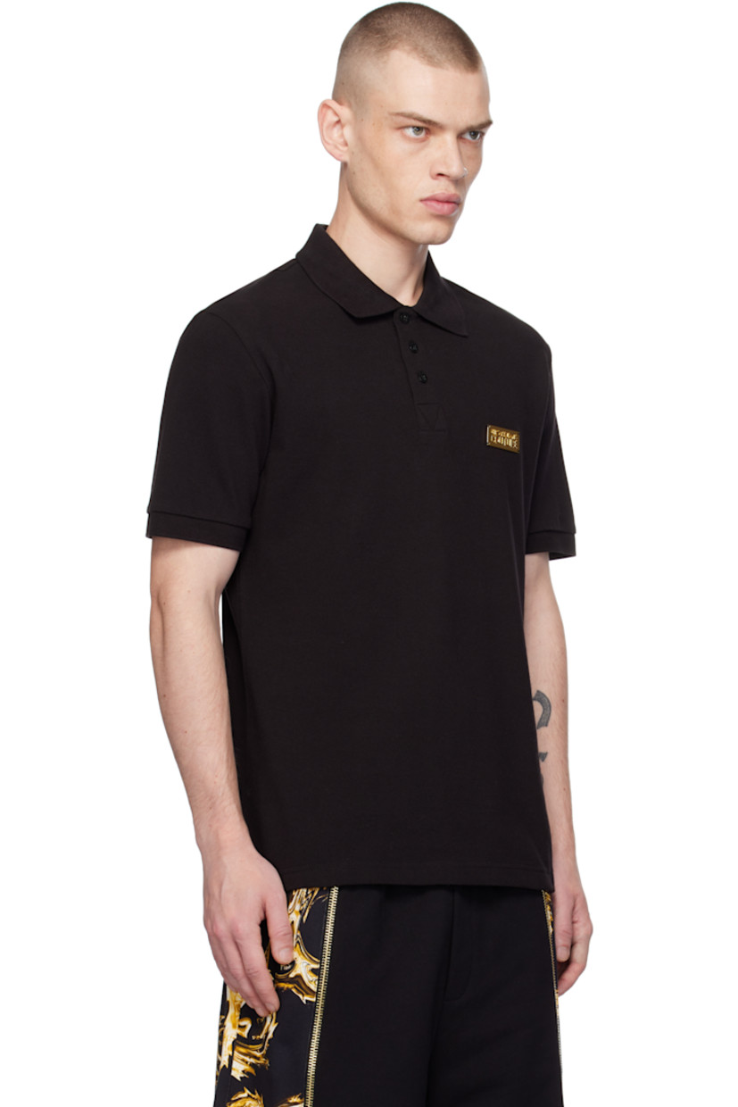 Slim-fit cotton piqué polo.

· Rib-knit spread collar and cuffs 
· Three-button placket
· Gold-tone logo plaque at chest
· Tennis-tail hem

Supplier color: Black