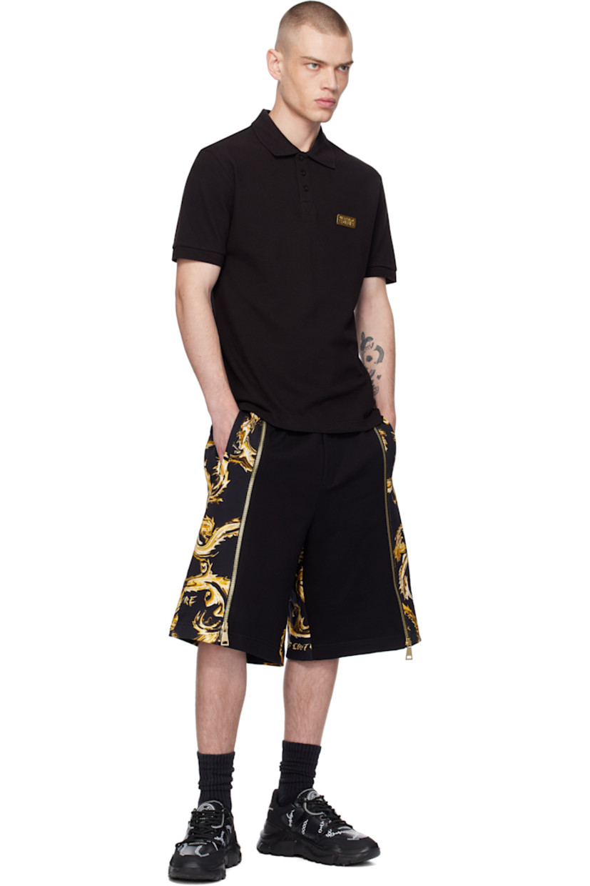 Slim-fit cotton piqué polo.

· Rib-knit spread collar and cuffs 
· Three-button placket
· Gold-tone logo plaque at chest
· Tennis-tail hem

Supplier color: Black