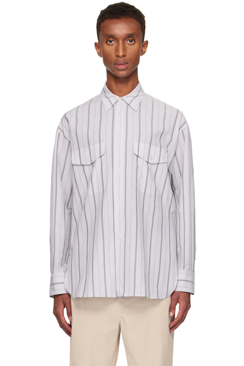 Cotton lawn shirt. Stripes throughout.

· Spread collar
· Button closure
· Flap pockets
· Vented shirttail hem
· Pleated single-button barrel cuffs

Supplier color: Stripe