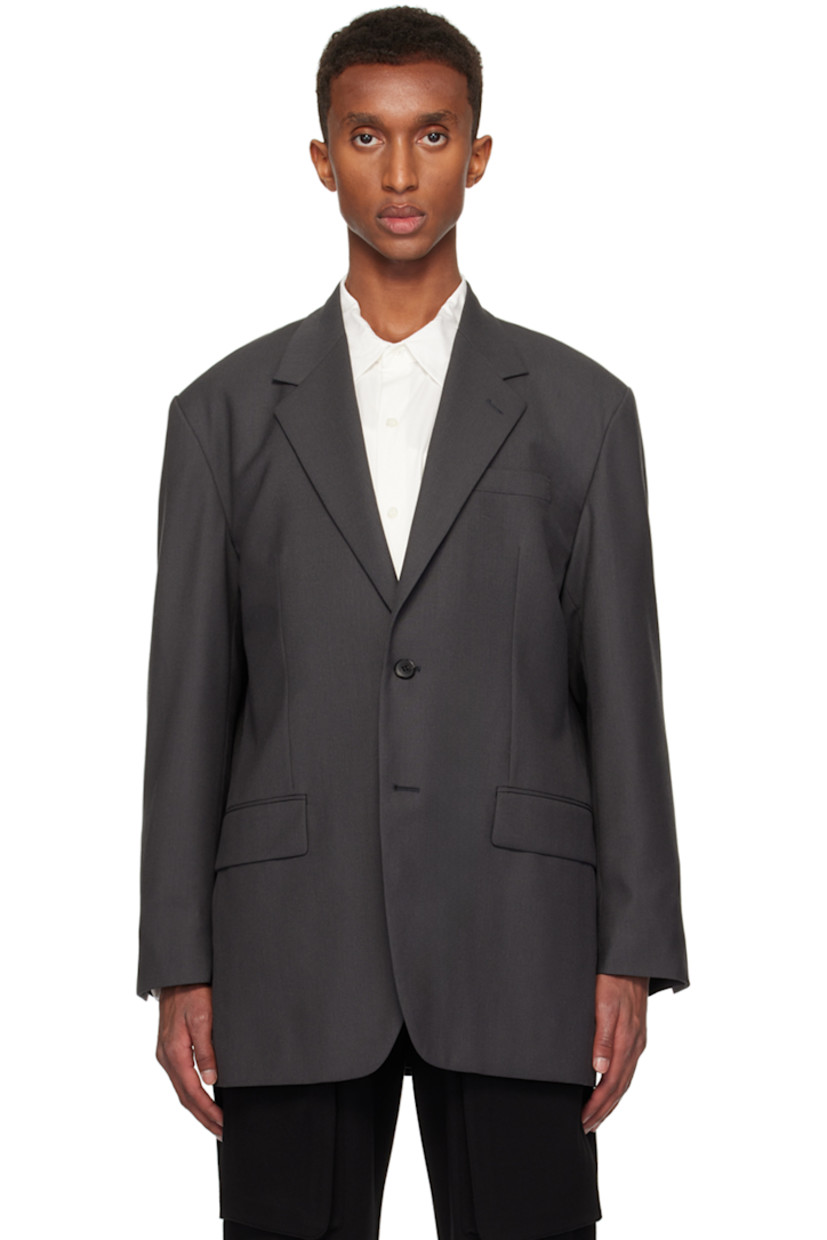 Lightweight tropical worsted wool barathea blazer.

· Notched lapel
· Button closure
· Welt pocket and flap pockets
· Padded shoulders
· Four-button surgeon's cuffs
· Central vent at back hem
· Welt pockets at interior
· Full satin lining 

Supplier color: Charcoal