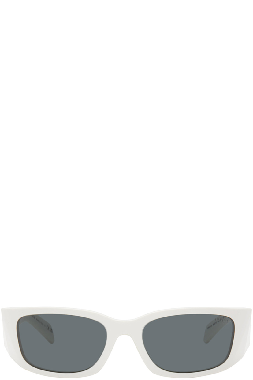 Rectangular wraparound acetate-frame sunglasses in white. 

· Gray lenses with 100% UVA/UVB protection
· Logo etched at lens
· Integrated nose pads
· Logo engraved at temples
· Includes saffiano leather case
· Size: 60.18 120

Supplier color: Talc/Dark grey
