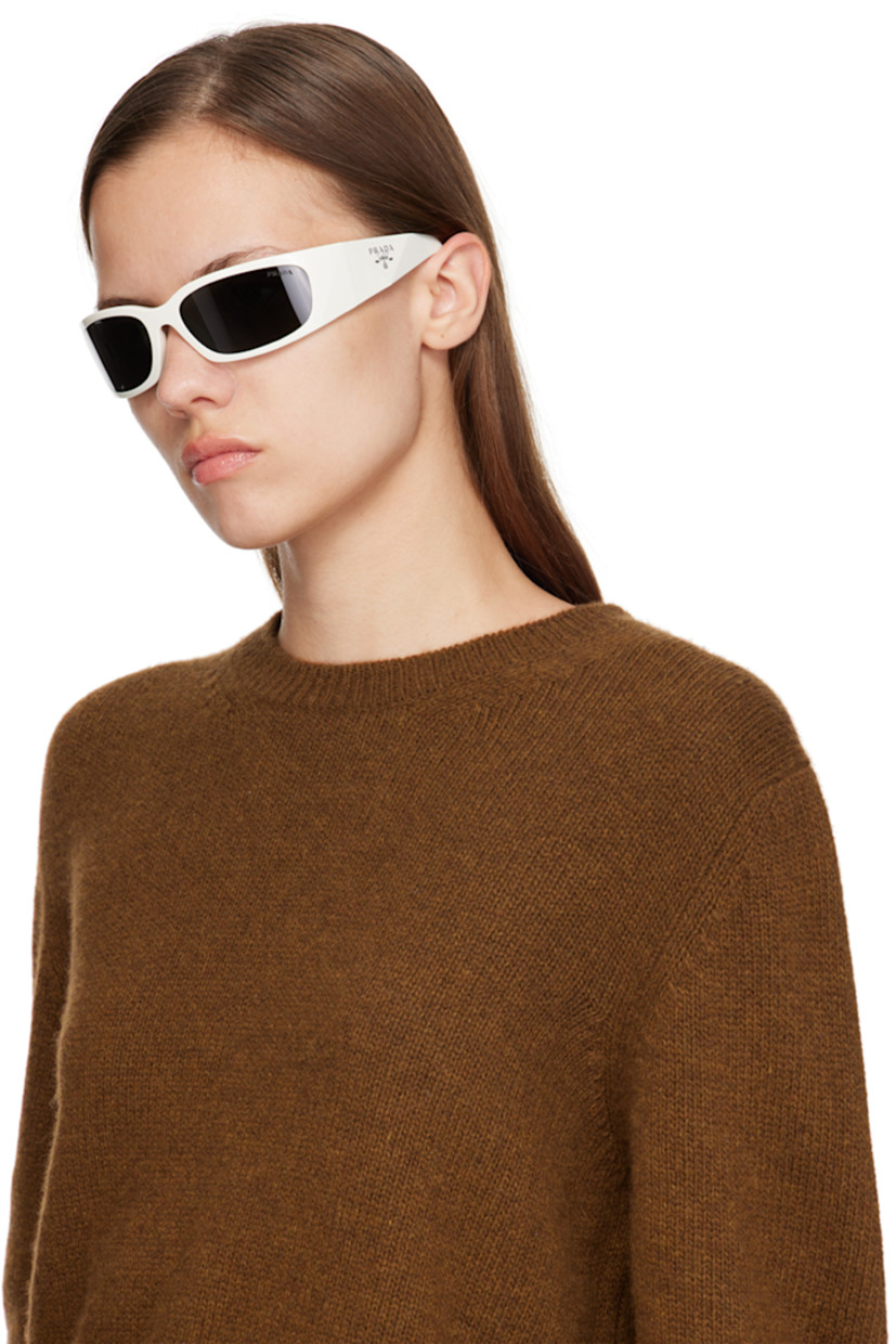 Rectangular wraparound acetate-frame sunglasses in white. 

· Gray lenses with 100% UVA/UVB protection
· Logo etched at lens
· Integrated nose pads
· Logo engraved at temples
· Includes saffiano leather case
· Size: 60.18 120

Supplier color: Talc/Dark grey