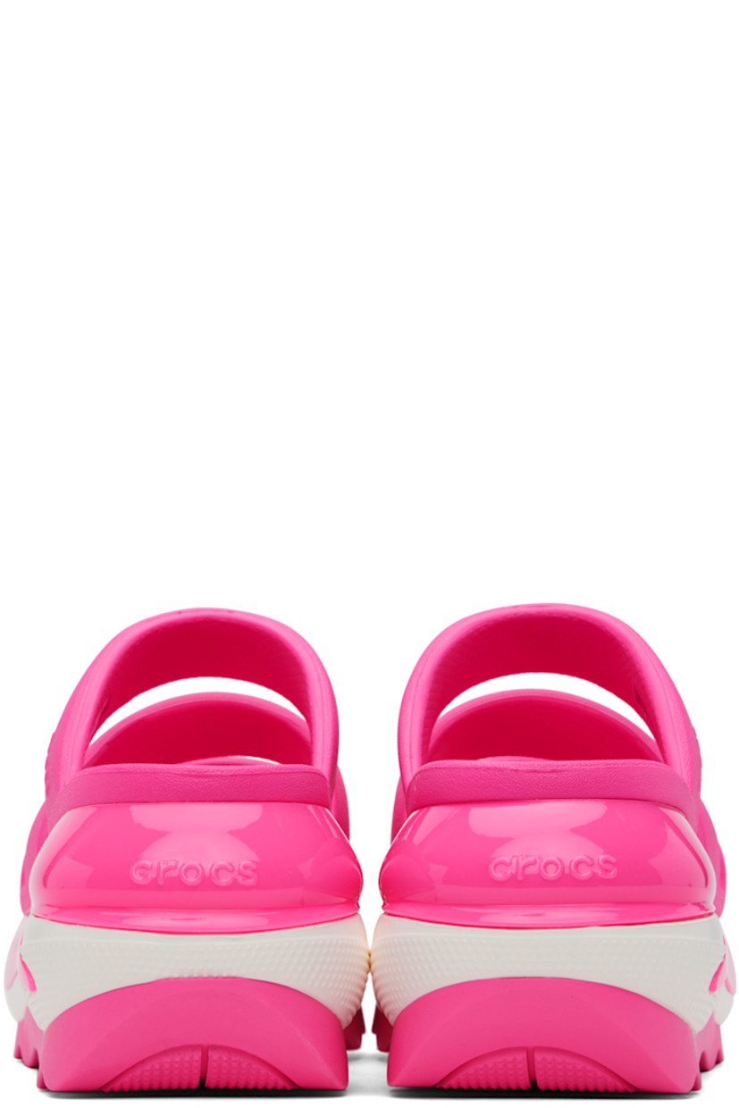 Croslite™ rubber slip-on flat sandals in pink.

· Open toe
· Padded straps at vamp
· Logo-embossed outer side and heel
· Molded rubber footbed
· Sculptural platform rubber midsole
· Treaded rubber sole
· Platform: H3"

Supplier color: Pink crush