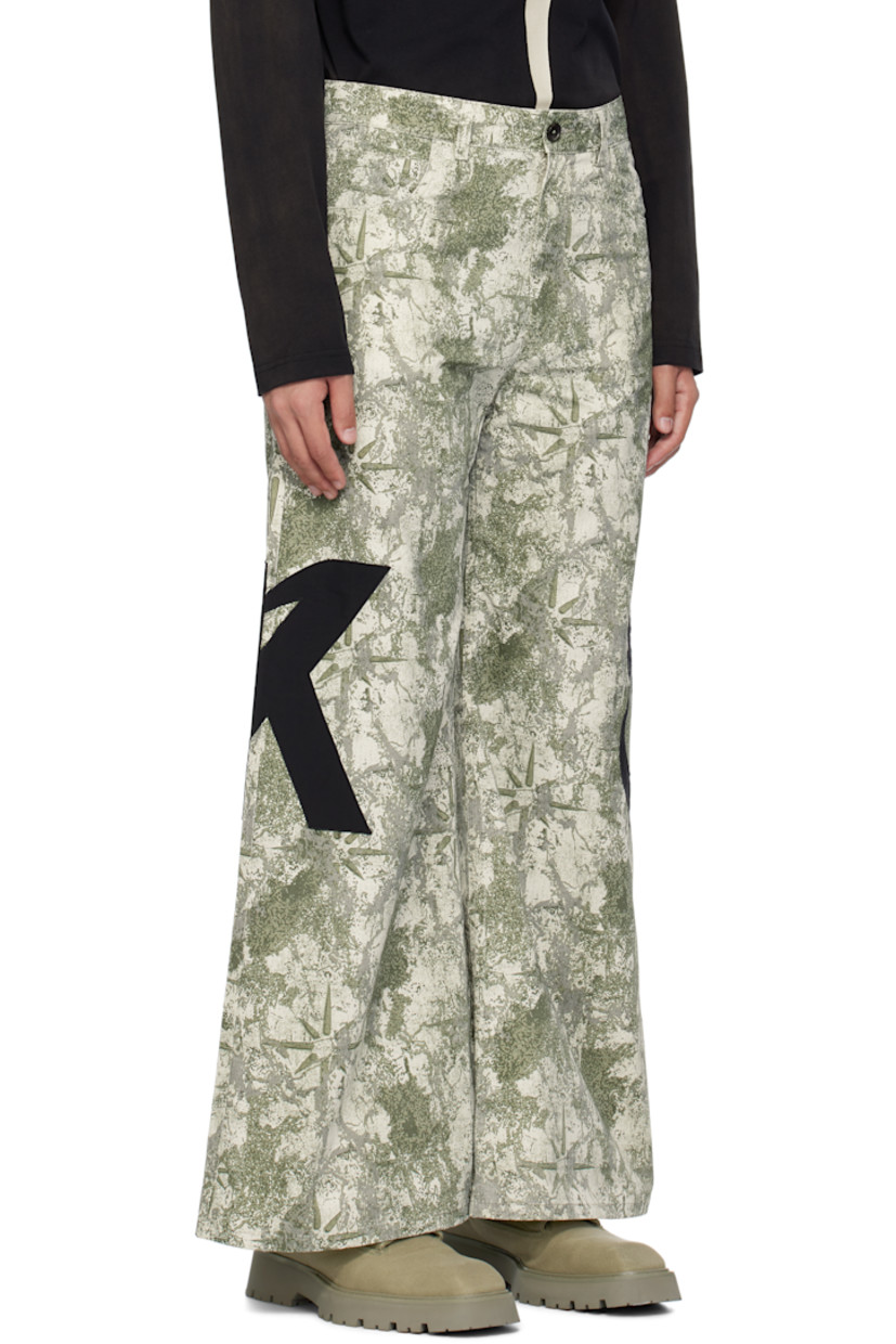 Nylon- and cotton-blend taffeta trousers. Logo camouflage pattern printed throughout.

· Belt loops
· Five-pocket styling
· Zip-fly
· Logo appliqué at outseams
· Unlined

Supplier color: Green