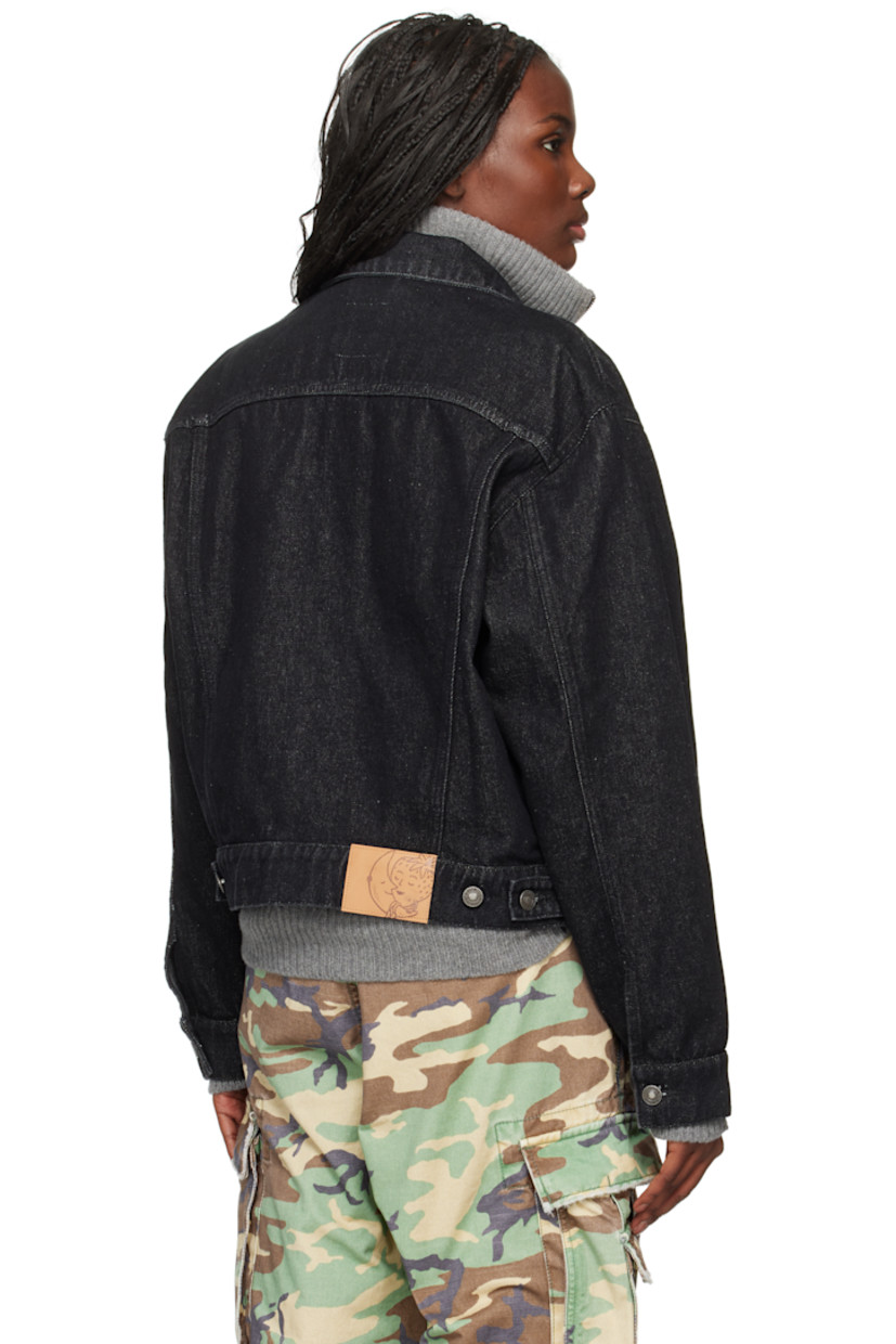 Deadstock non-stretch denim jacket.

· Spread collar
· Button closure
· Flap and welt pockets
· Cropped hem
· Single-button barrel cuffs
· Adjustable button tabs at back hem
· Logo patch at back hem
· Silver-tone hardware

Supplier color: Black