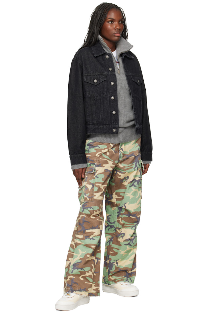 Deadstock non-stretch denim jacket.

· Spread collar
· Button closure
· Flap and welt pockets
· Cropped hem
· Single-button barrel cuffs
· Adjustable button tabs at back hem
· Logo patch at back hem
· Silver-tone hardware

Supplier color: Black