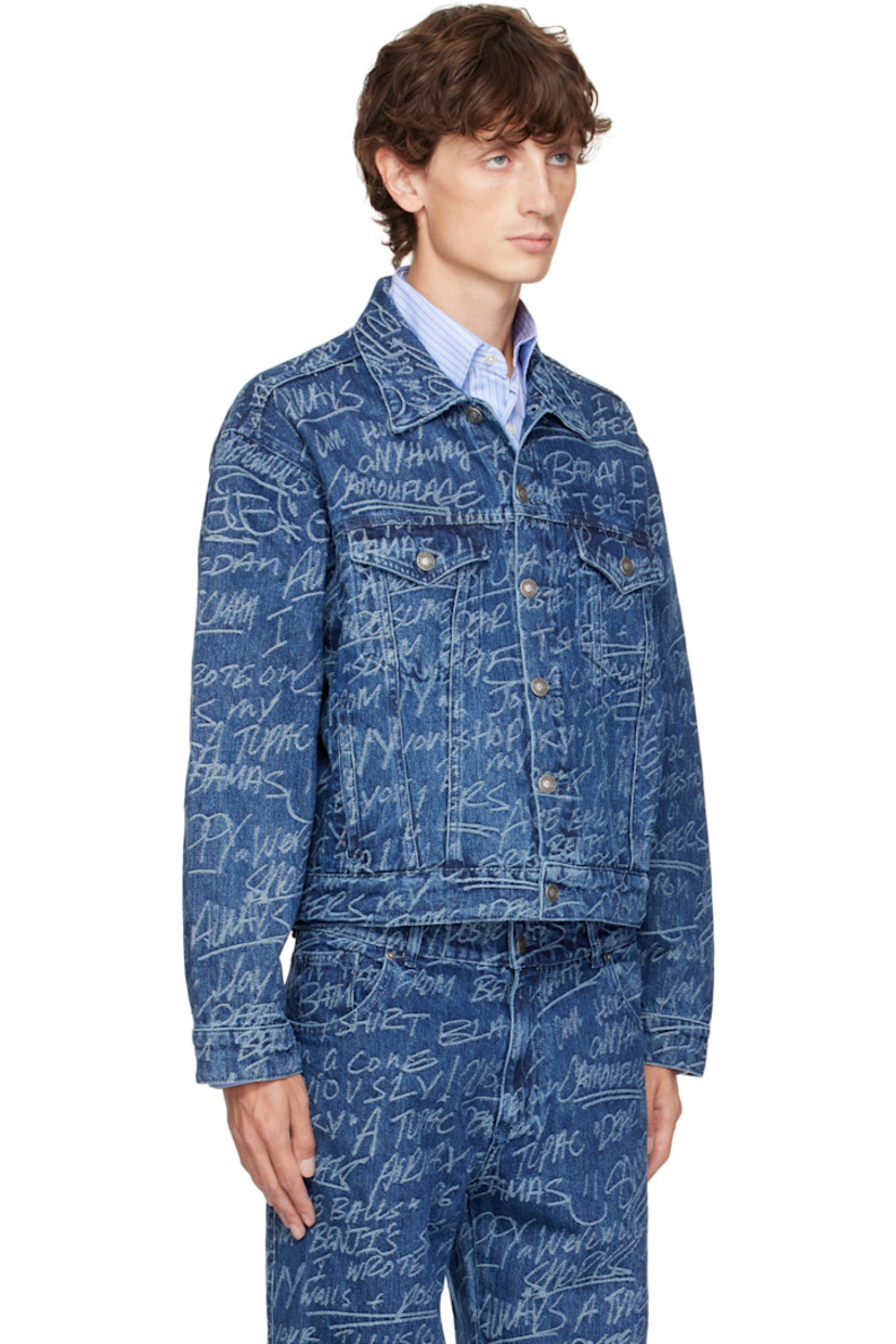Non-stretch denim jacket. Jacquard graphic pattern and fading throughout.

· Spread collar
· Button closure
· Flap and welt pockets
· Single-button barrel cuffs
· Adjustable button tabs at back hem
· Logo patch at back hem

Featuring artwork by Ben Solomon. 

Supplier color: Dark blue